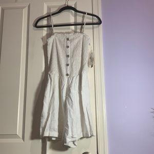 White romper with smocked top from Garage